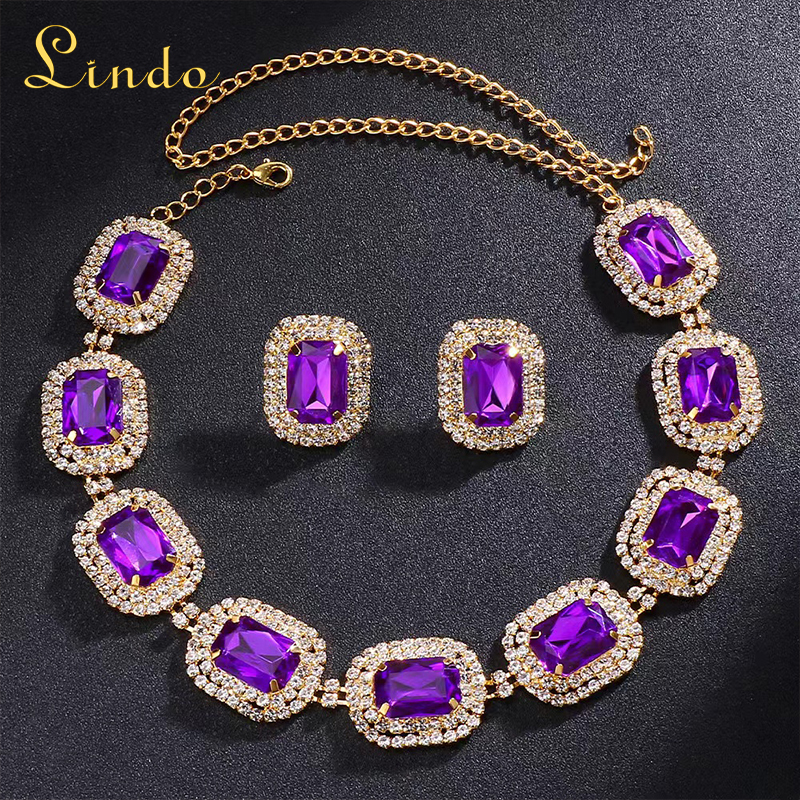 Gold Tone Purple Crystal Earring and Necklace Set