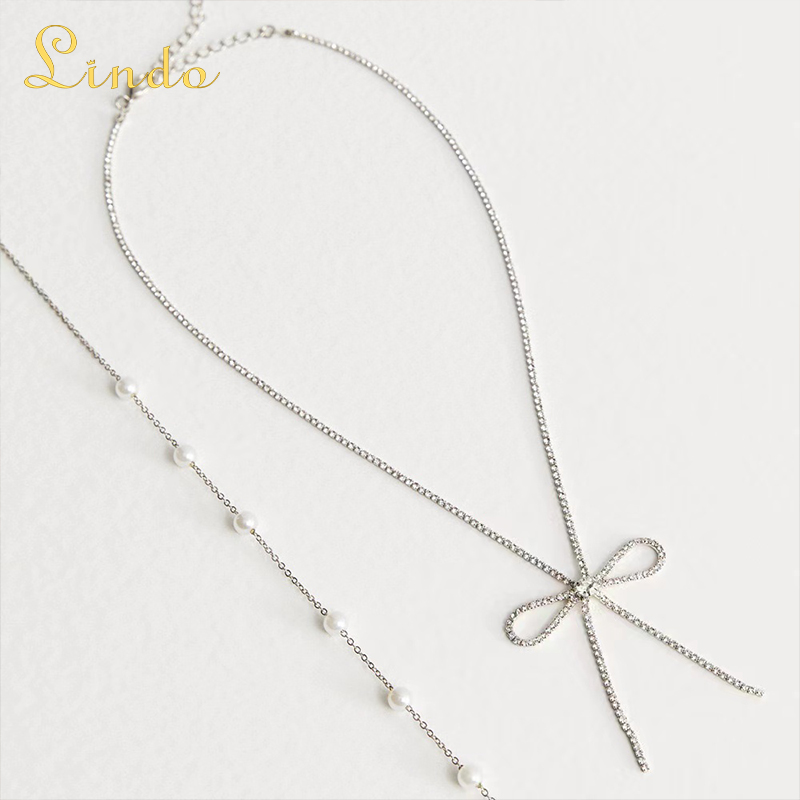 Elegant Bow Tie and Pearl Necklace